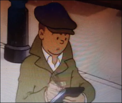 Tintin manque une fois encore de se faire écraser.
Quel est le numéro de la plaque ?