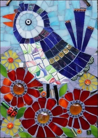 Quel oiseau d'Australie, de la famille des Estrildidae, est magnifiquement paré d'un plumage multicolore, souvent vert sur le dos, violet sur la poitrine ?