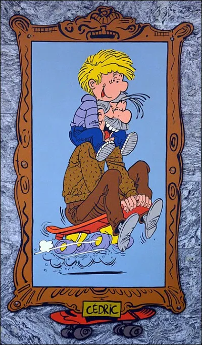 Quel est le nom et la nationalité de la fille dont est amoureux Cédric dans les B.D. éponymes ?