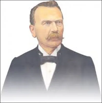 Comment s'appelle cet entrepreneur originaire de Charleroi qui créa en 1875 une société de distribution développant des enseignes de commerce alimentaire ?