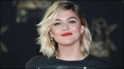 Le coach de Louane à l'émission "The Voice" était Garou.