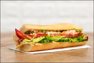 "Je suis à table", est-ce du présent à valeur de passé/futur proche, de narration ou d'énonciation ?