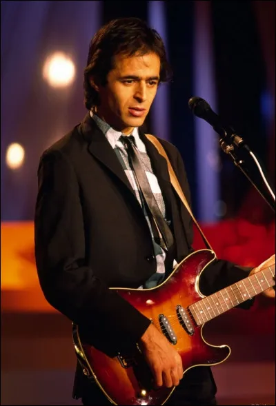 Quels sont les singles de son septième album, "Rouge" ?