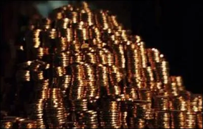 Quel est le nom de la créature qui a amené pour la première fois Harry Potter à son coffre fort à la banque des sorciers ?