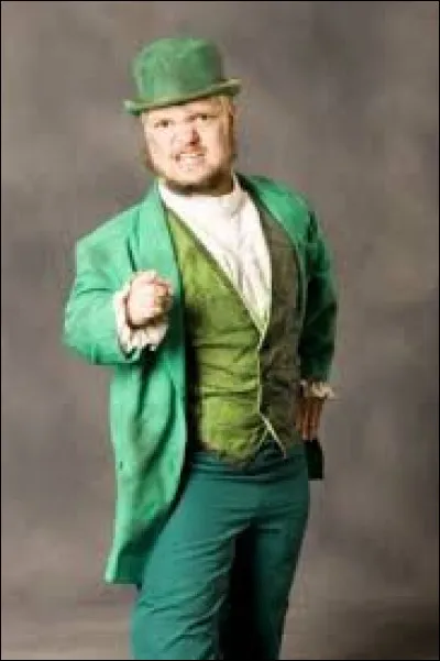Habillé de vert, ce catcheur se nomme :