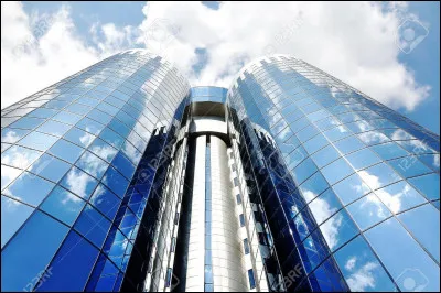 "... Dans mon building tout de verre et d'acier / je prends mon job, un rail de coke, un café...". Dans quelle chanson peut-on entendre ces paroles ?