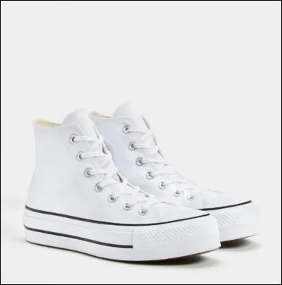 Quand la firme embauche-t-elle le basketteur américain, Chuck Taylor, comme commercial ?