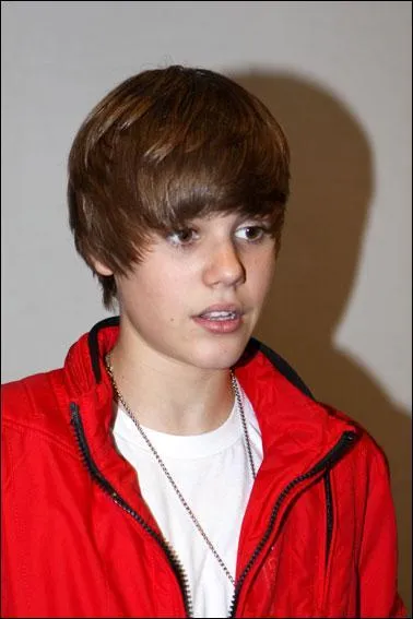 A quel ge Justin a_t_il commenc la musique ?