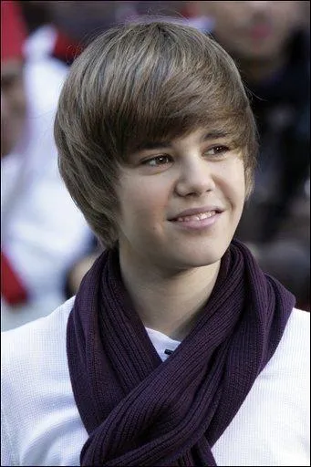 A quel place dans le classement Justin a-t-il fini lors de son premier concours de chant ?