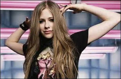 Quel est le nom de son premier album solo sorti en 2002 ?