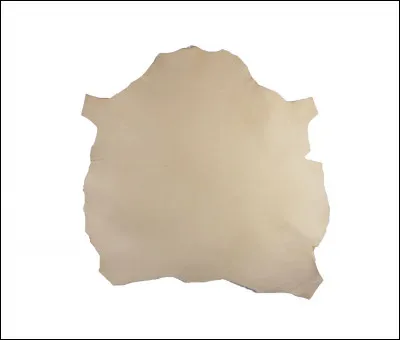 Quel est le nom de la peau de mouton préparée qui sert à couvrir les livres et à d'autres usages ?