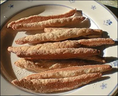 Quel est ce biscuit sablé parfumé à la vanille à base de farine, d'huile d'olive et de vin blanc, spécialité de Sète ?