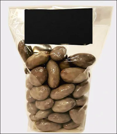 Quelle est cette confiserie croustillante, une amande entière enrobée de nougatine et de chocolat au lait, spécialité du Havre ?