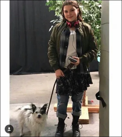 Comment s'appelle le chien que Kate avait adopté lorsqu'elle était adolescente ?