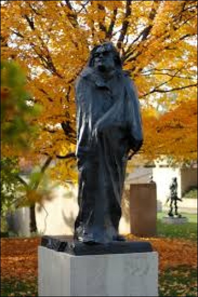 Quel écrivain est représenté sur cette statue de bronze réalisé par Auguste Rodin ?