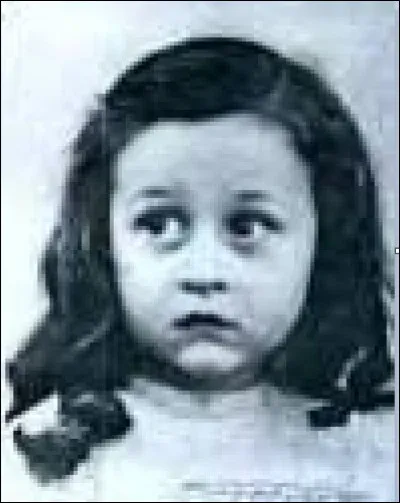 Indice : A gardé les cheveux longs, mais porte à présent de célèbres lunettes.