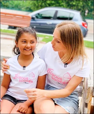 Qui est sur la photo à côté delle ?