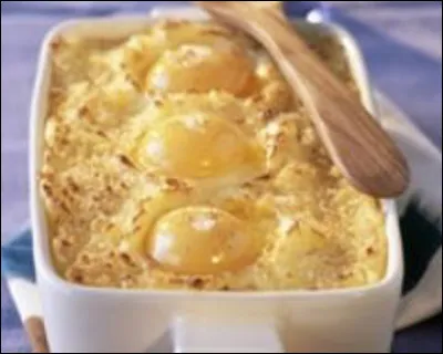 Quelle est cette recette à base de purée de pommes de terre que l'on creuse pour y déposer des jaunes d'oeufs, le tout cuit au four ?