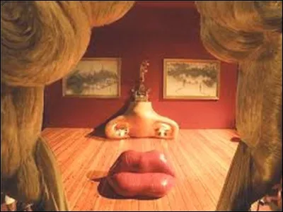 Cette œuvre surréaliste du "Visage de Mae West" est en réalité composé d'un canapé rouge, d'une cheminée et deux tableaux au mur. Qui a produit cette installation ludique ?