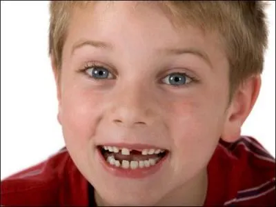 La dentition de lait complte d'un enfant comporte :