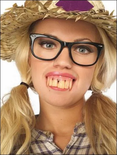 "Elle est connue pour avoir les dents longues."
 Que signifie cette affirmation ?