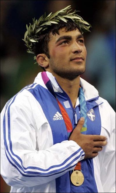 À quel âge Ilías Iliádis est-il devenu le plus jeune champion olympique de l'histoire du judo ?