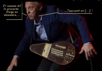 Cet artiste protéiforme est doté d'une belle voix de baryton. Mais quel est l'instrument bizarre avec lequel il s'accompagne ?