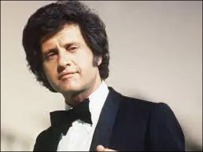 Complétez le titre de cette chanson de Joe Dassin : "Siffler...