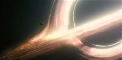 Ah ! Il fait parler de lui, le trou noir ! Mais qu'est-ce donc ? 
Tout simplement un passage, un raccourci pour que je puisse retourner dans mes mondes. Parfois, je me divertis en créant un passage dans le temps et ainsi revenir à des époques lointaines. D'ailleurs, j'avais inspiré un autre film avec le trou noir. 
Est-ce que vous pouvez me donner son titre ?