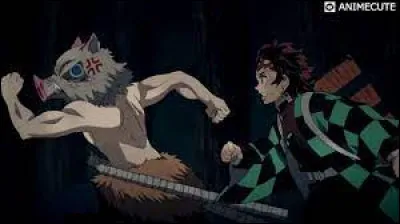 Par quel nom Inosuke appelle-t-il Tanjiro ?