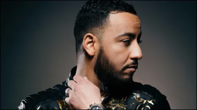 Quel est le nom de scène du rappeur sur la photo, dont l'une des chansons s'appelle "J'ai mal" ?