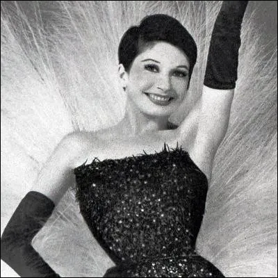 Quelle chanson écrite par Bernard Dimey est devenue la signature de la danseuse Zizi Jeanmaire ?