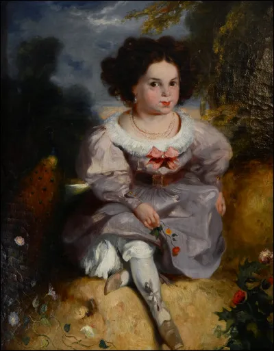 Quel animal se trouve à la droite de la petite fille ?