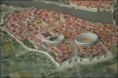 Colonie romaine créée en 46 av. J.-C sur un oppidum celte, elle devient une ville importante qui a conservé de nombreux vestiges. C'est la ville de résidence de l'empereur Constantin au IVe siècle, puis elle devient préfecture des Gaules au Ve.