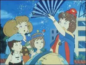 (Les aventures de la famille Glady) Gr�ce � quel objet Moumine fait-elle voyager ses petits-enfants � travers le monde ?