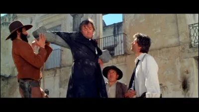 Dans "la colère de Dieu", quel acteur est le Père Van Horne ancien braqueur de banque, entrainé malgré lui dans l'armée mexicaine ?