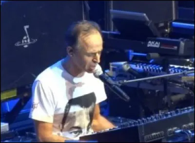 En quelle année compose-t-il l'album "S'il suffisait d'aimer" pour Céline Dion ?