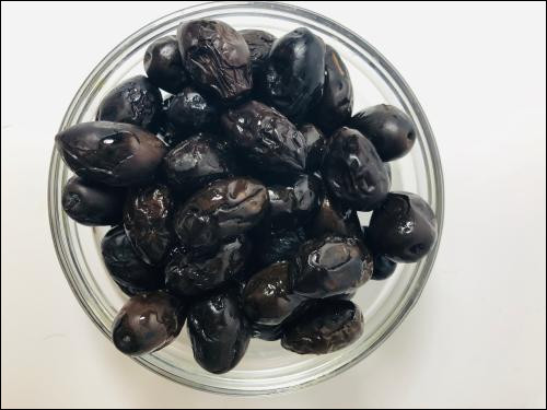 Quel est le nom de cette variété d'olives noires du Gard, très répandue dans le sud de la France ?