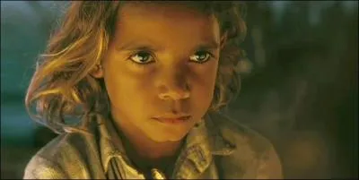 Dans 'Australia', quelle chanson le jeune aborigne apprend-il  jouer avec son harmonica ?