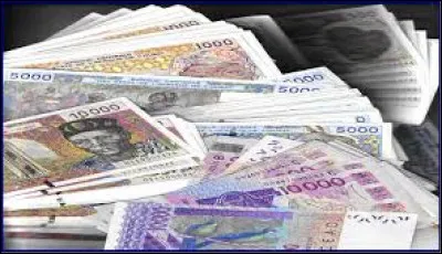 À Kinshasa, on règle ses achats avec...