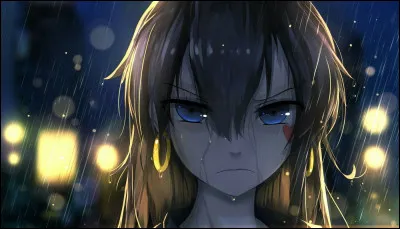 De quelle couleur est sa boucle d'oreille ?