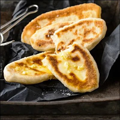 Quelle feuille de pain cuite sur la paroi d�un four est courante dans les pays d�Asie centrale et du Sud ?