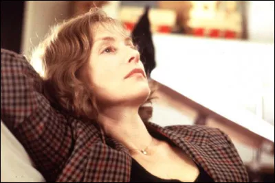 Dans quel film Isabelle Huppert est-elle une femme heureuse en ménage, du moins en apparence ?