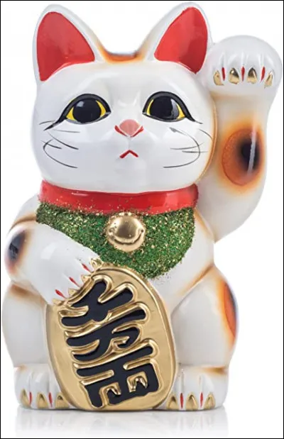 Comment s'appelle cette statue traditionnelle du Japon, en céramique ou en porcelaine ?