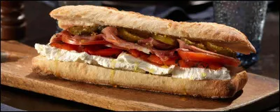 Quel est ce sandwich espagnol au jambon ibérique et à la tomate accompagné d'un filet d'huile d'olive ?