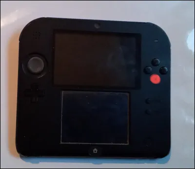 À quoi sert la touche représentée par le point orange ?