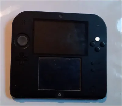 À quoi sert la touche représentée par le point blanc ?