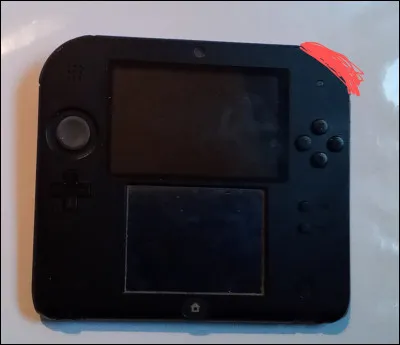 À quoi sert la touche représentée par le trait orange ?