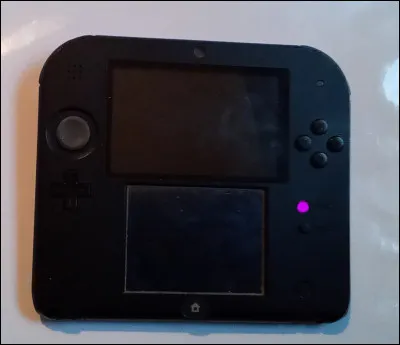 À quoi sert la touche représentée par le point violet ?