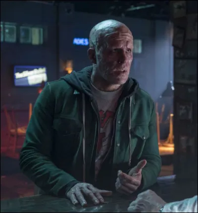 Dans quel film Ryan Reynolds est-il un mercenaire devant faire équipe pour protéger un jeune garçon ?